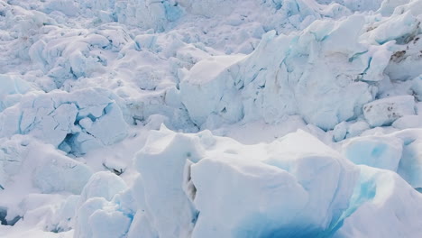 Huge-white-glacier-surface-in-frozen-wasteland,-aerial-drone-shot