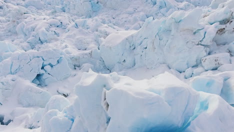 huge white glacier surface in frozen wasteland, aerial drone shot