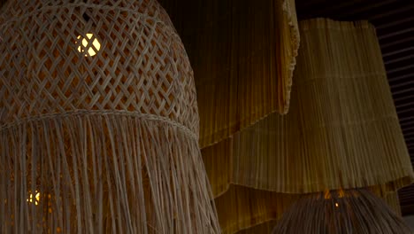 beach restaurant lamps handmade of palm leaf embroidery handicraft bayside bayfront evening chill lounge slow motion sunset