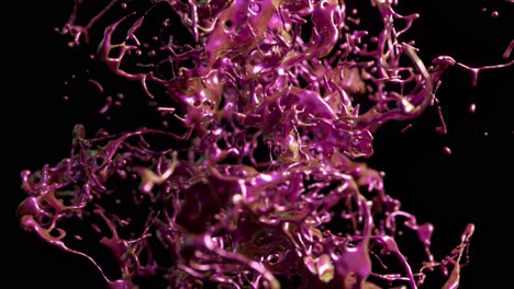 salpicaduras líquidas rosadas y púrpuras