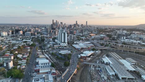 establishing push in shot of brisbane city, with mayne railway yard and the icb inner city bypass and brisbane showgrounds