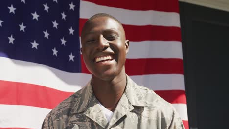 video of african american soldier standing outside house