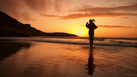 girl child, silhouette and sunset by ocean