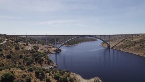 aerial view of the viaduct for high-speed train over the almonte river in caceres, extremadura