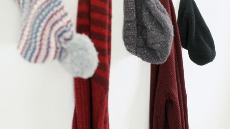 warm clothes hanging on hook 4k