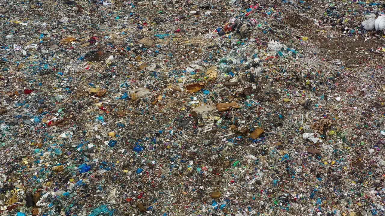 Aerial view from camera moving above rubbish dump