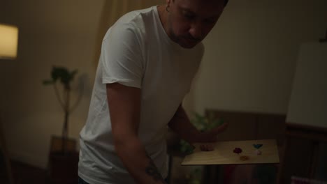 artist painting at home