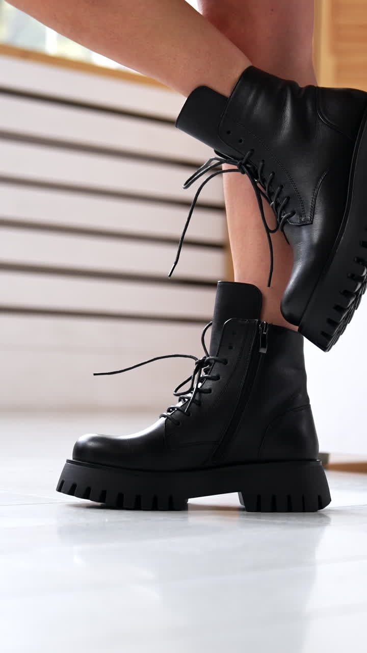 Woman shoes showroom. Fashion female footwear in new boutique. Vertical video