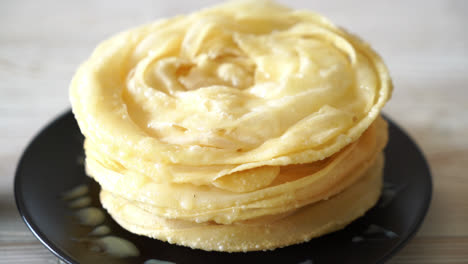 fried crispy roti dough with sweetened condensed milk