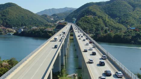 a new bridge cross over a beautiful river