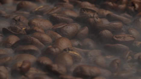 coffee beans fresh roast with smoke, video in 4k, 50fps
