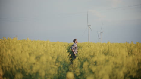 Male-Farmer-Amidst-Plants-In-Farm