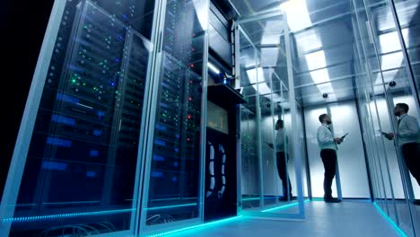 it workers in glowing data center