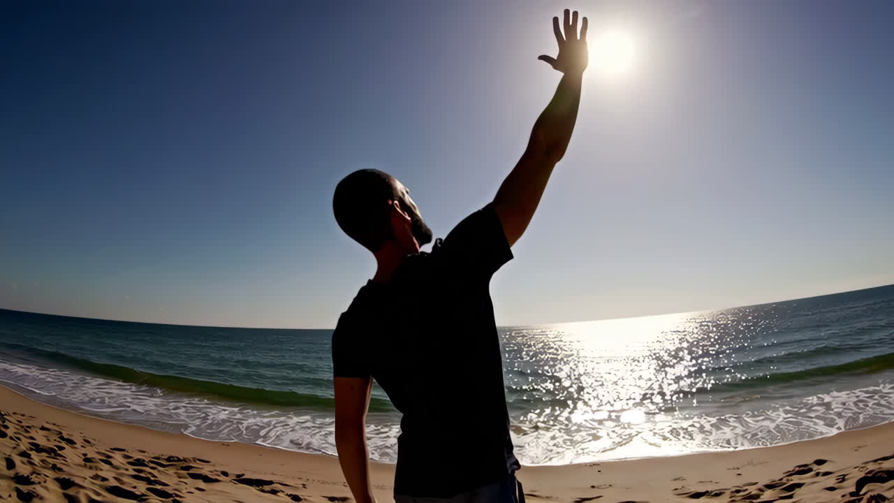 Man enjoying the beach at sunrise/sunset