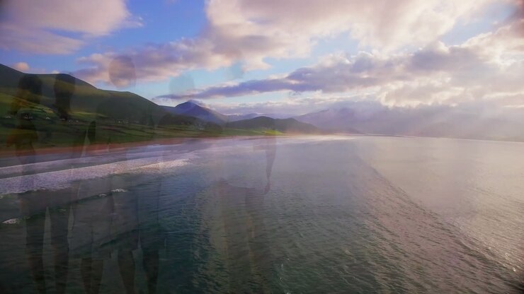 Animazione di paesaggio con oceano su famiglia che si abbraccia in spiaggia.