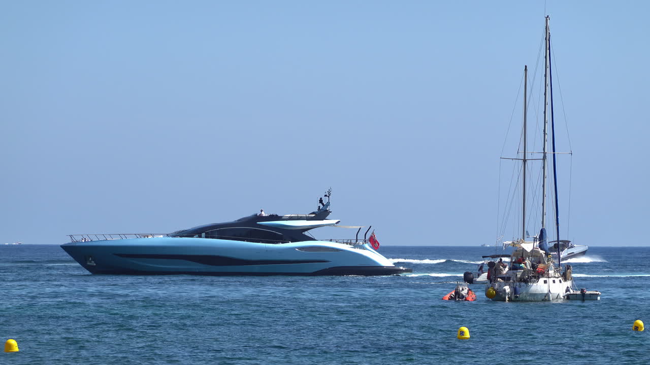 Boats moving on the sea in Golfe-Juan, France in daylight