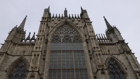 hand-held shot of the york minster cathedral facade in overcast weather