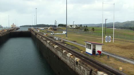 ship entering the last chamber of gatun locks before gatun lake, panama canal transit