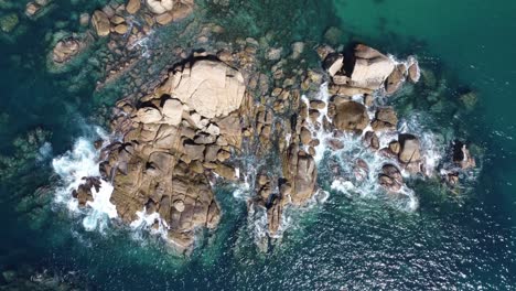 aerial cenital drone shot of acapulco rocks