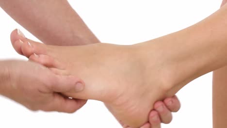 foot massage isolated on white