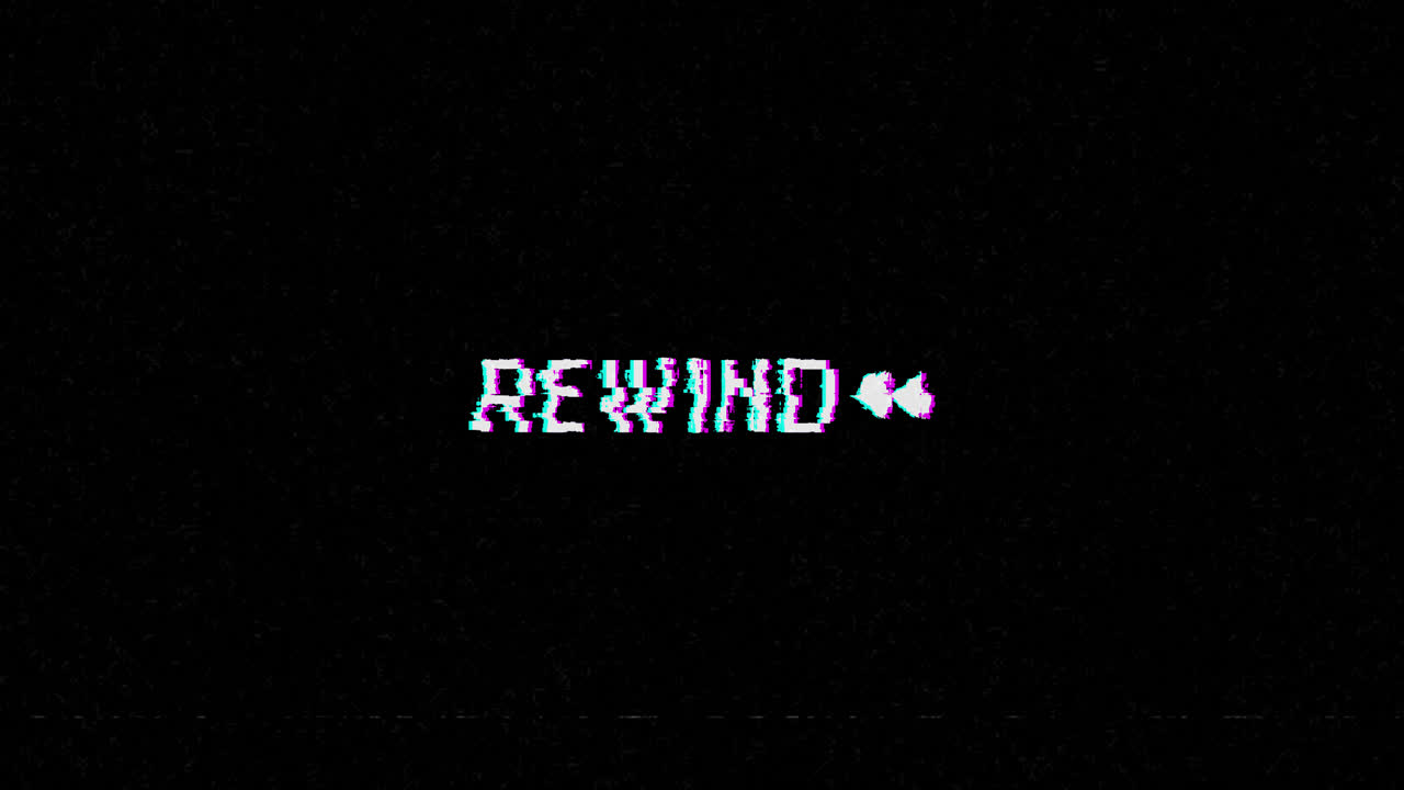 Teks Putar Mundur dengan Efek Glitch dan Statis VHS