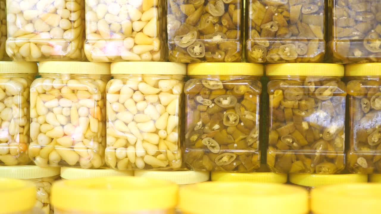 Pickled Peppers and Vegetables in Jars