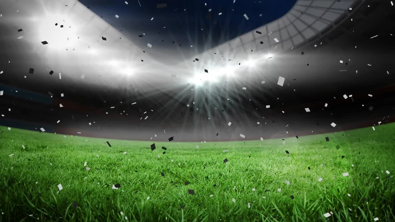 밤에 스포츠 경기장 위에 떠다니는 콘페티의 애니메이션