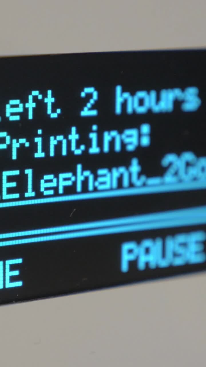 Close-up of Digital Display Screen Showing Printing Status