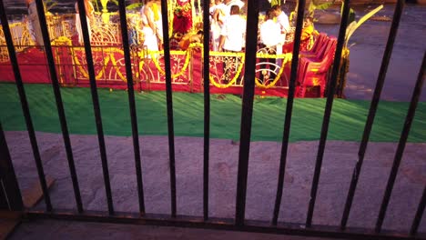 vertical dolly shot of priests preparing stage for hampi water festival at karnataka, india