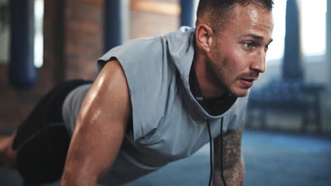 fitness, push up and health with man in gym