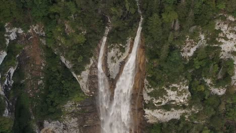 Aerial view of the picturesque Seerenbachfälle waterfall cascading down the cliffs, Switzerland.