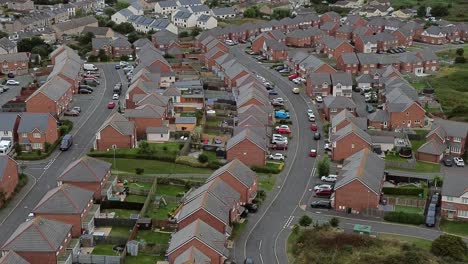 aerial view above port of holyhead suburban town neighbourhood brick house property in north wales
