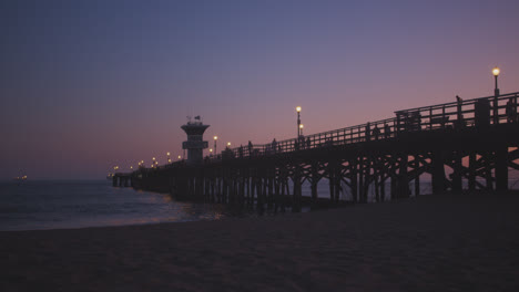 the seal beach pier under purple skies