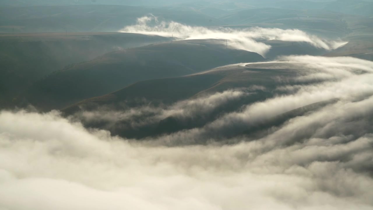 Thick Morning Fog Rolling Over Rolling Hills
