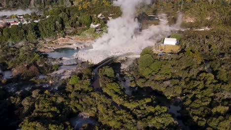 Drone-fly-to-Pohutu-Geyser-in-popular-tourist-attraction-in-Rotorua,-New-Zealand