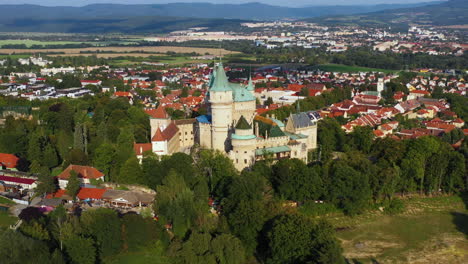 wide rotating drone shot of castle of spirits or bojnice castle in slovakia