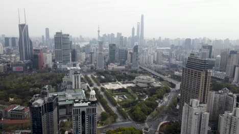 shanghai city metropolis skyline during covid-19 pandemic, aerial flight