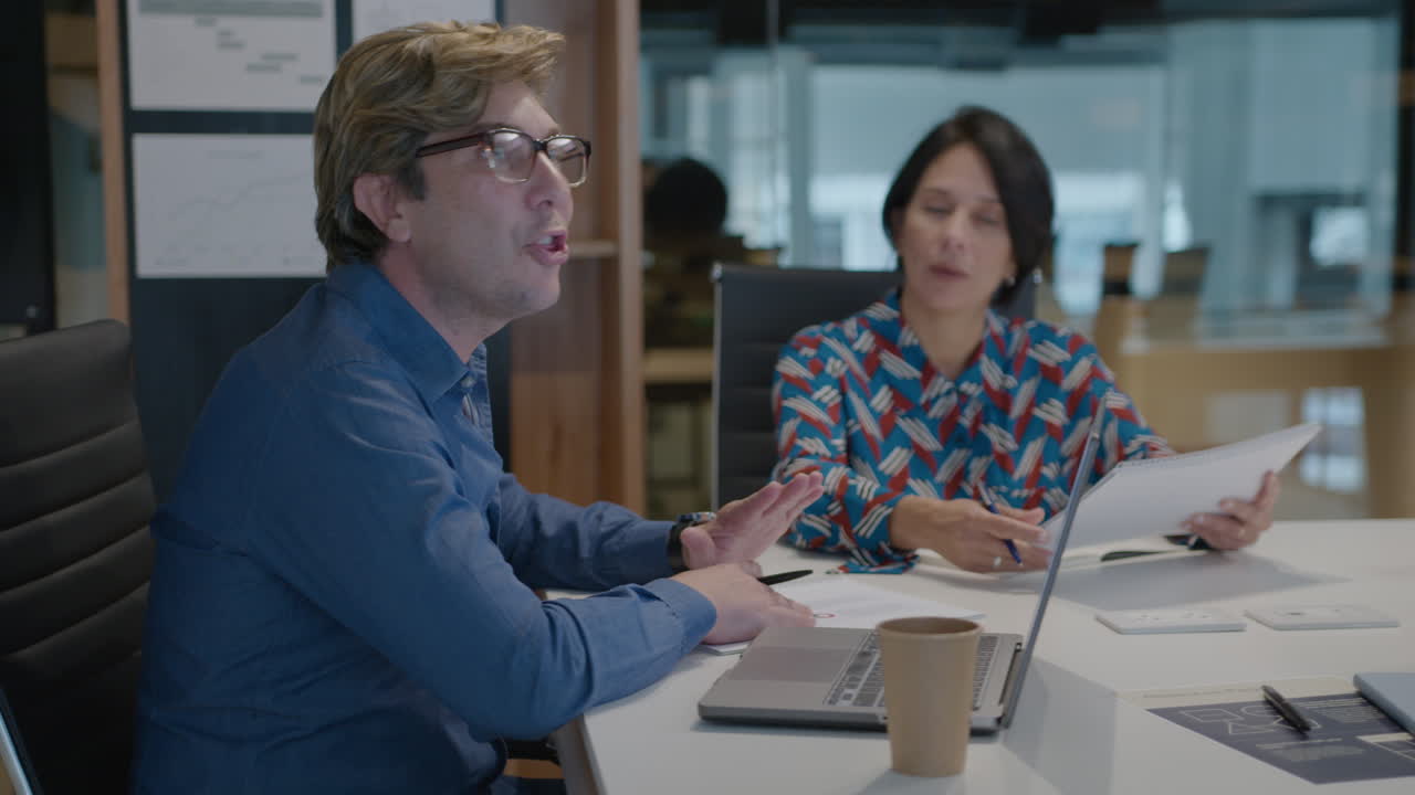 Male CEO Leading Office Meeting with Board of Directors