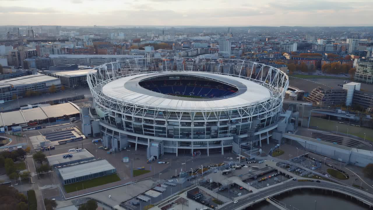 Aerial view of a modern stadium in a city