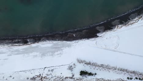 Snowy-beach-landscape-during-winter