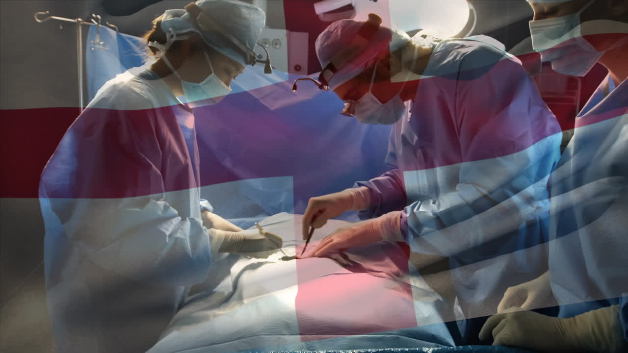수술실에서 외과 의사 들 위 에 흔들리는 영국 국기 의 애니메이션