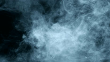 4k digital perfectamente sin costuras bucle de humo flotando lentamente a través del espacio contra el negro