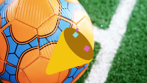animación de maíz de confeti sobre una pelota de fútbol