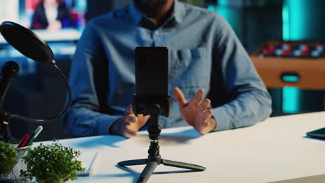 phone on holder used by content creator