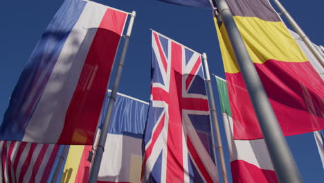 Vertical-Flags-Of-European-Union-Countries-Against-Blue-Sky-In-Baden-Baden,-Germany