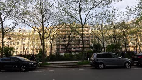 cars and pedestrians on a paris street