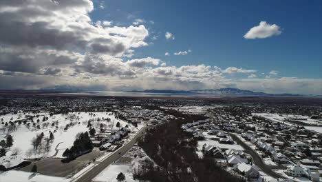 drone dolly shot over icy snow covered town