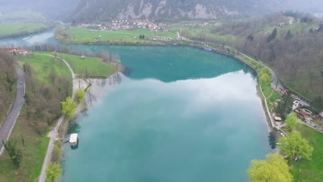 aerial view of soca river near the wellhead - national park triglav in slovenia