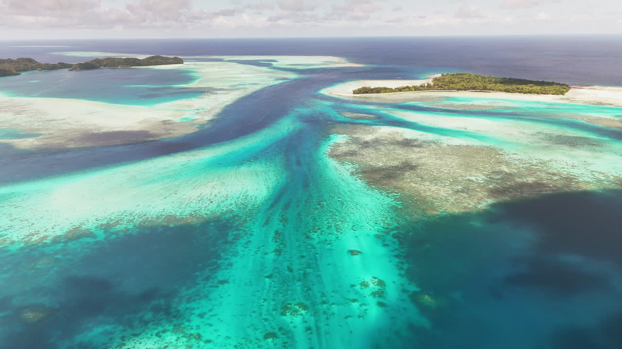 Stunning drone footage showcasing the crystal blue waters and islands of Palau. Revealing aerial drone shot