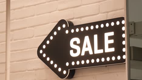 sale sign with arrow